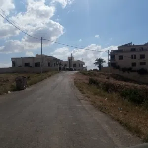 قطعة أرض للبيع الدمينة دونم و200متر سكن خاص على شارعين في أجمل موقع