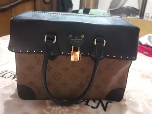 Louis Vuitton . Hand Bags . brown4