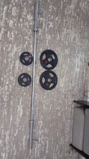 بار اولمبي مع اوزان للبيع