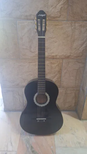 Black Angel Classical Guitar - Includes bag and picks - very good condition