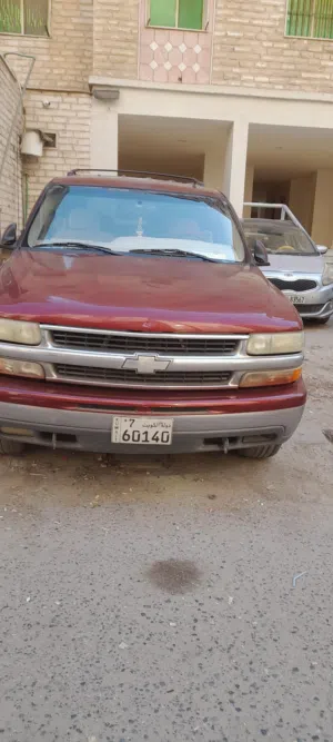 شيفروليه تاهو 2002 موديل كامل المواصفات - لون أحمر، مستعمل بحالة ممتازة