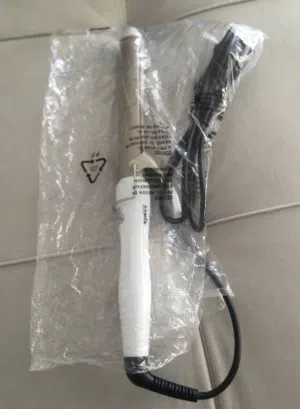 مكواة لتصفيف الشعر للبيع