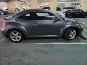 volkswagen Beetle ( lady driven) Excellent condition.