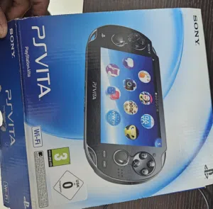 4 PS Vita game cartridges and psvita console in good condition