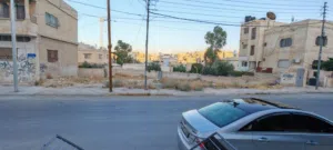 ارض تجاريه واجهه عريضه حي الجنينه