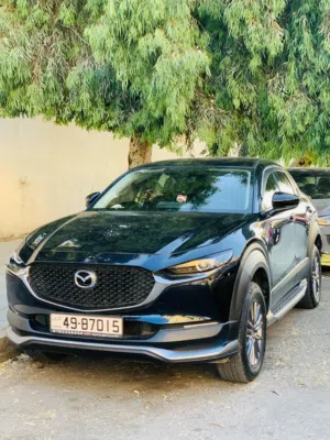 سيارة مازدا CX-30 2021 كحلي كهربائية مستعملة بحالة ممتازة مع مواصفات يابانية