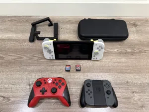 Nintendo Switch with case Mario controller extra joy-cons 128 GB micro SD card
