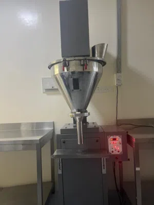 مكينة تعبئة للمواد الغذائية المطحونة