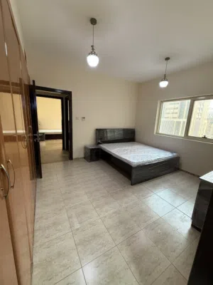 New furnished master bedroom in 2600 AED