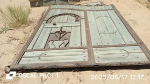 باب فردتين حديد ولوح حاجه كويسه