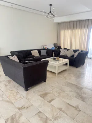 Black sofa set with extra chair