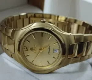 ساعة سويسرية فاخرة مطلية ذهب قراط 22 جديدة أصلية