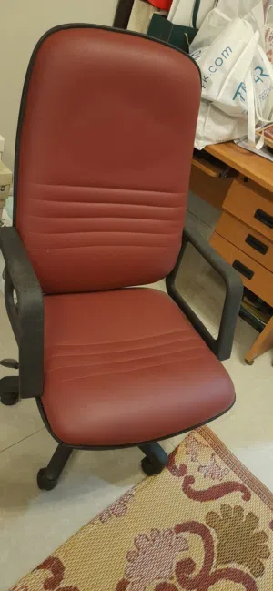 Office desk and a leather chair  for  sale.