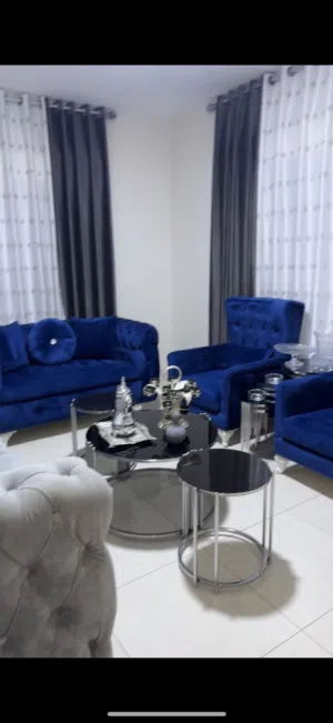 طقم كنب  7 مقاعد مع البرادي والطاولات وطقم كورنر مع البرادي والطاولات والسجاد الستاند خشب تفصيل ثقيل
