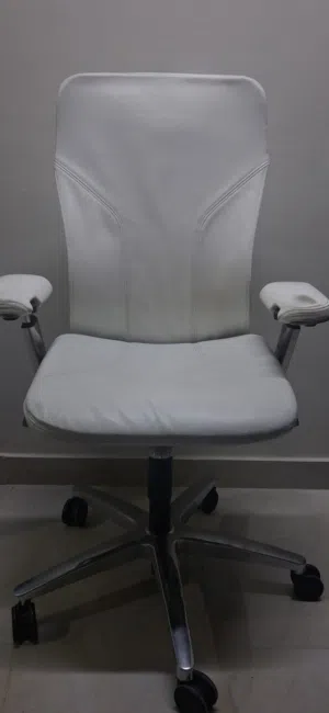 Allsteel Acuity task chair with a white leather seat and white removable back
