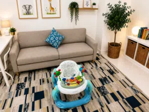 Almost New Baby Walker by Junior Brand عربة اطفال للبيت جديدة تقريباً ماركة جونيور