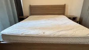 Bed with mattress and two bedside