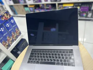 Apple . macOS . 15" . Used0