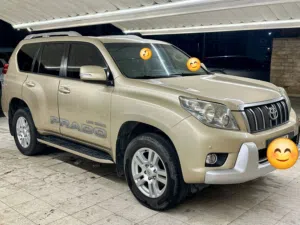 Toyota prado VX 2013 Model 6 cylinder golden color 295Km driven