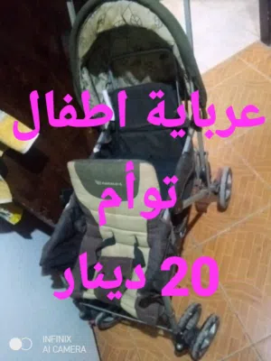 عرباية اطفال توائم بحالة ممتازة