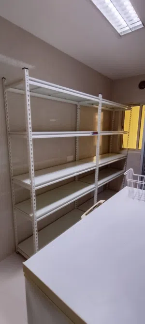 slim white shelveing rack