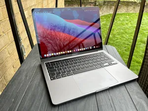 macbook pro m1 with touch par and magic mouse m2