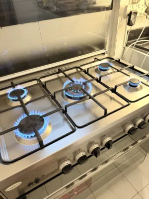 FlameGas  stove size 90*60 in good condition / location salmiya