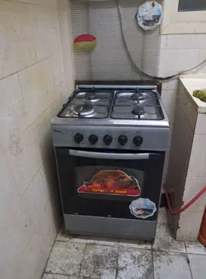 بوتاجاز مع اسطوانة غاز ومنظم وخرطوم