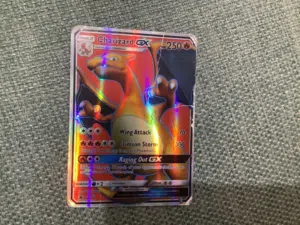 Rainbow Rare Charizard GX SM60 – Moderately Played Diagonal Rainbow Shine i need to quicksell for 70