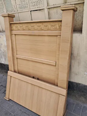 single wooden bed