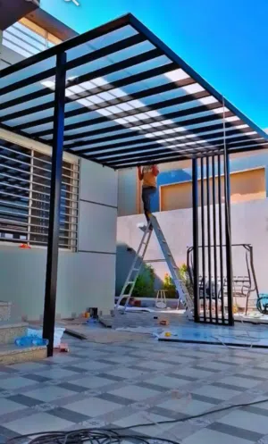 حداد مظلات سواتر هناجر أبواب شبابيك