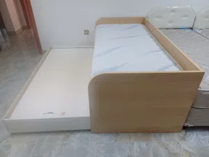 Twin size bed frame and mattress with an underbed
