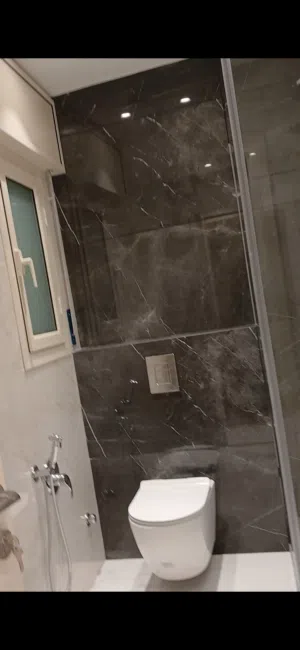 مبنى ثلاث شقق جراج اصانصير . حديث. سكنى. ايجار. النوفليين .