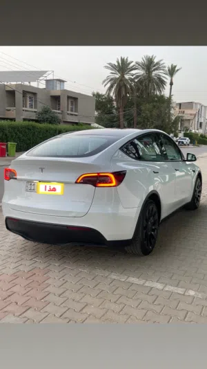 تيسلا Y 2022 دبل ماطور لونك رينج اون لاين السياره فول 1/1 للاخير داخل ابيض 5 راكب المرغوب نص قطعه ..