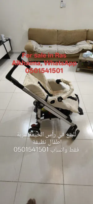 baby stroller and slide for sale in Ras Alkhaima
