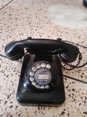 Old unique Telephone for Sale in good condition.