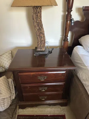 Bed room complete king size bed and two side tables one big dresser with mirror