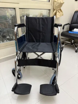 WHEELCHAIR ALMOST NEW