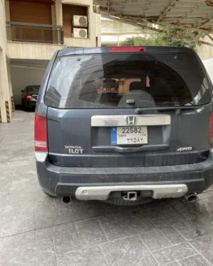 Honda . Pilot . 2011 . Used1