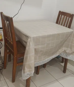 Square wooden table with chairs