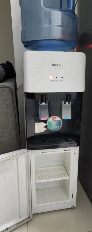 مبرد مياه impex مع خزانة سفلية بحالة ممتازة water cooler and heater
