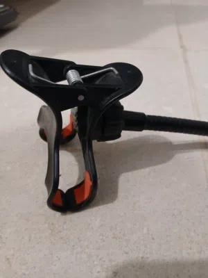 حامل موبايل قابل للثتي جديد 1 دينار - New mobile holder able to bend 1K.D
