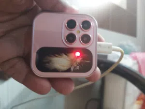 تلفون صغير قابل للطي اللون قنفلي جديد الميزات زاكره 32 فيهو كاميرا خلفيفه مع فلاش اشيل 2 شريحه