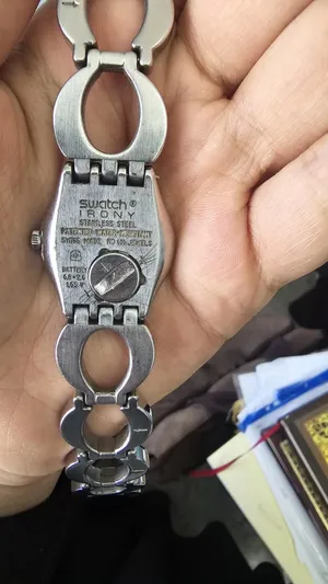Swatch . Analog Quartz . Silver0