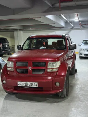 دودج نيترو 2013 SXT نظام أوتوماتيك لون أحمر بحالة ممتازة