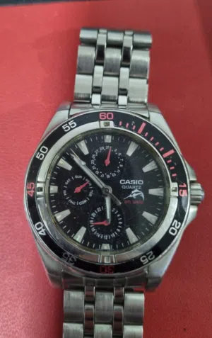Used Original Casio Edifice Chronograph black background .