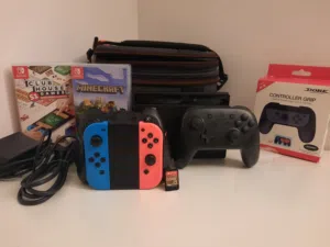 nintendo switch with controllers games etc