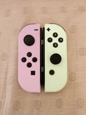 original Nintendo switch joy cons pastel green and purple