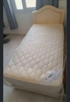 Single cot and Bed with double shelf side table