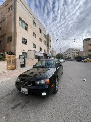 سيارة هيونداي أفانتي XD موديل 2002 لون أسود فل كامل للبيع كاش